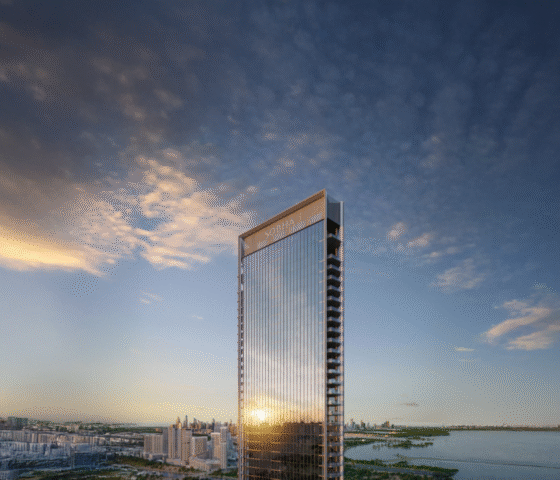 Luxury tower facade with glass balconies and skyline views