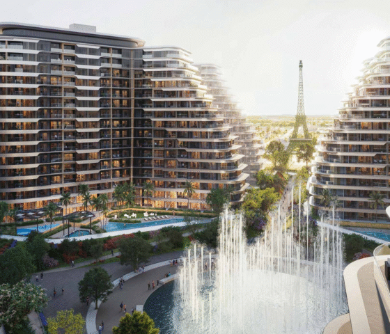 Resort-style apartment buildings with water features and landscaped walkways at WAADA – Rayhan 1