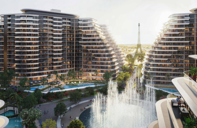 Resort-style apartment buildings with water features and landscaped walkways at WAADA – Rayhan 1