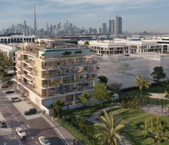 Modern mid-rise building with rooftop greenery and city skyline view
