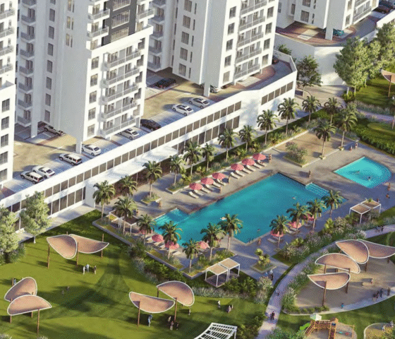 Aerial view of South Garden Tower 3 by WASL featuring landscaped gardens, children’s play areas, and a large swimming pool with sun loungers.