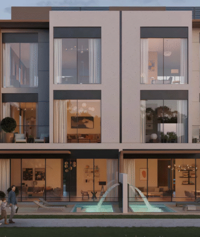Evening view of townhouse with pool at Terra Golf Collection Phase 2