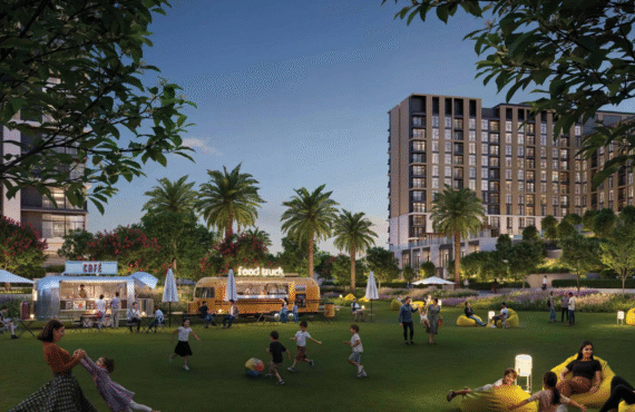 The central community park at Terra Gardens, featuring food trucks, beanbag seating, and family recreation in the evening.