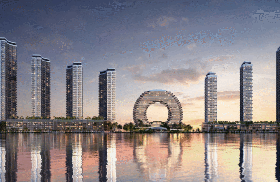 The skyline view of Sobha AquaCrest towers by Sobha Realty reflected in the water, showing the entire waterfront development.