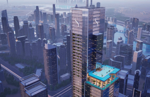 The main Sobha SkyParks skyscraper and the surrounding dense urban cityscape, viewed from above.