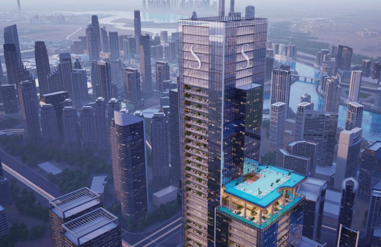 The main Sobha SkyParks skyscraper and the surrounding dense urban cityscape, viewed from above.