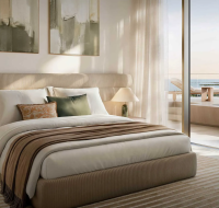 contemporary bedroom featuring elegant décor, modern furnishings, and a comfortable, relaxing ambiance.