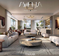 Spacious modern living room with soft-toned furniture, open-plan layout, and floor-to-ceiling windows.