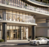 The elegant main entrance of the Bellagio building, featuring a welcoming and stylish design.