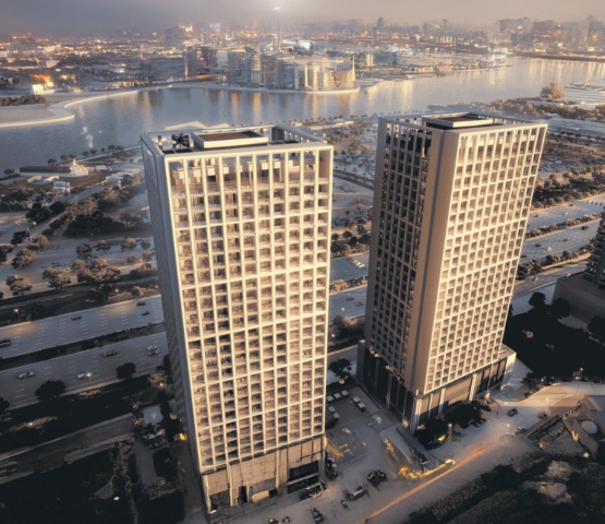 Stylish urban apartment building at Binghatti Moonlight with views of the glowing cityscape