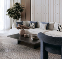 Modern living room with neutral tones, large windows, and city view backdrop