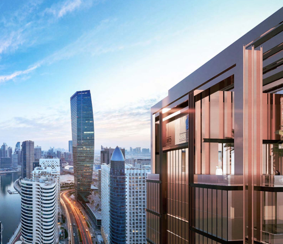 Modern balcony overlooking city skyline at sunrise
