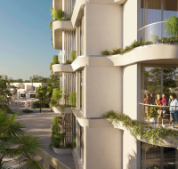 Contemporary apartment facade with residents enjoying spacious, curved balconies with lush plants.
