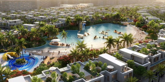 An aerial view showing the master-planned DAMAC Riverside community, showcasing the themed clusters and lush green surroundings.