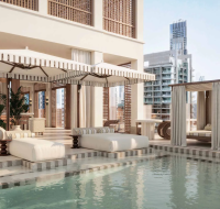 Infinity pool with panoramic views of the Dubai skyline at Elire Residences