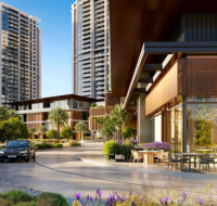 Modern residential complex with high-rise towers, landscaped gardens, outdoor café seating, and a luxury car in the driveway.