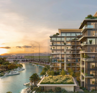 Contemporary waterfront residences developed by Ellington Properties with scenic water views.