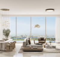Elegant residents lounge with natural light and outdoor views.