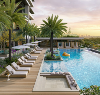 Resort-style swimming pool at Everly Place with landscaped surroundings.