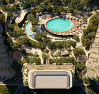 Dubai Islands – Aerial view of luxury residential community with central swimming pool and lush greenery.