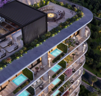 Courtyard view with landscaped balconies, modern play area, and colorful plants