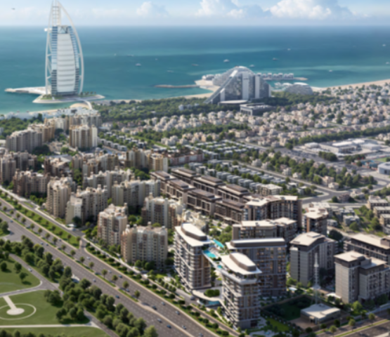 Aerial view of MJL Nourelle by Meraas, showing the residential buildings and the adjacent Burj Al Arab.