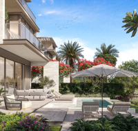 community view of landscaped parks and leisure pools at Nad Al Sheba Gardens