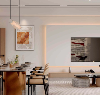 Elegant entrance lobby with a modern reception desk, stylish seating, and a water-like glass wall.