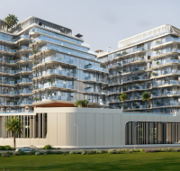 Modern building with curved balconies and glass front on a green street