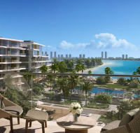 The exclusive sea view from a balcony at Palm Central Private Residences, with the city skyline in the distance.