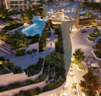 Lush, illuminated central park with walking paths, outdoor seating areas, and a distinctive clubhouse building at dusk.