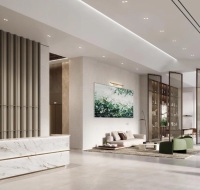 Modern luxury lobby at Ellington Properties with marble reception and stylish seating .