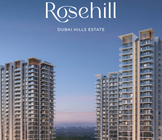 Evening view of twin residential towers with rooftop pool and lush landscaped surroundings