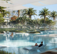 A resort-style infinity pool offering residents a serene space to relax with direct views of the surrounding water.