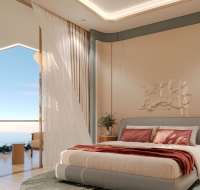 Elegant master bedroom with sea and golf course views