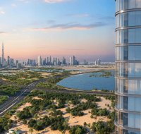 Luxury apartments with panoramic skyline and waterfront views at sunset