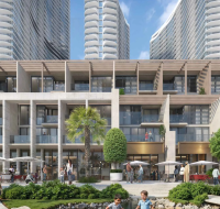 Modern low-rise residences with shaded balconies, landscaped pathways, and people walking through the courtyard.