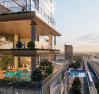 A multi-level Sobha SkyParks amenity deck, featuring a pool and vertical gardens overlooking Sheikh Zayed Road and the city skyline.