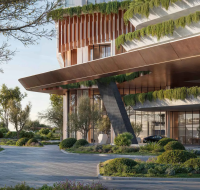 Modern building entrance with cantilevered canopy, greenery cascading from terraces, landscaped driveway, and parked cars.