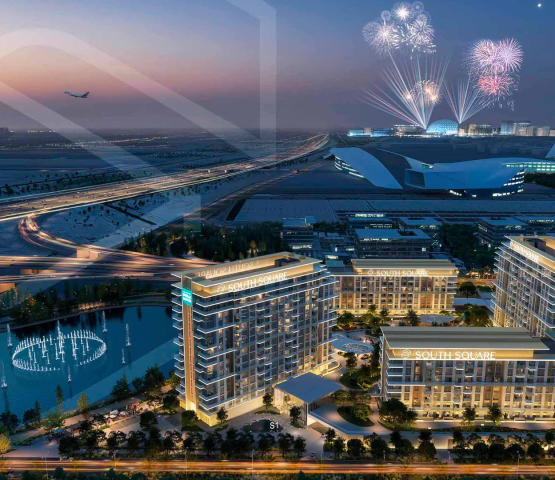 Night view of residential towers with lake, highway, and fireworks in the distance