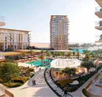 Lush poolside area with landscaped gardens and tall modern buildings