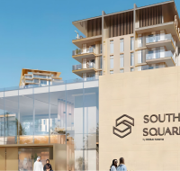Entrance signage of South Square by Dubai South with elegant architecture