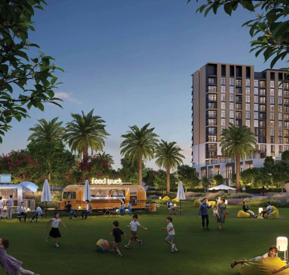 The central community park at Terra Gardens, featuring food trucks, beanbag seating, and family recreation in the evening.