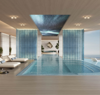 Infinity swimming pool overlooking the sea with modern design