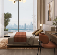 Modern apartment bedroom featuring minimalist furniture and soft color palette