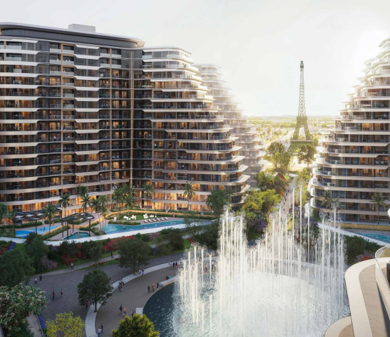 Resort-style apartment buildings with water features and landscaped walkways at WAADA – Rayhan 1