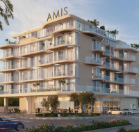 Modern apartment tower with clean lines and balcony spaces