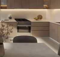 Stylish open kitchen with marble finishes and modern appliances